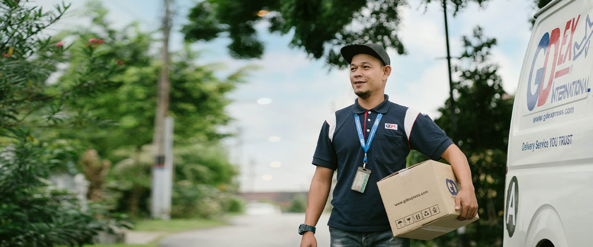 GDEX courier delivering a parcel